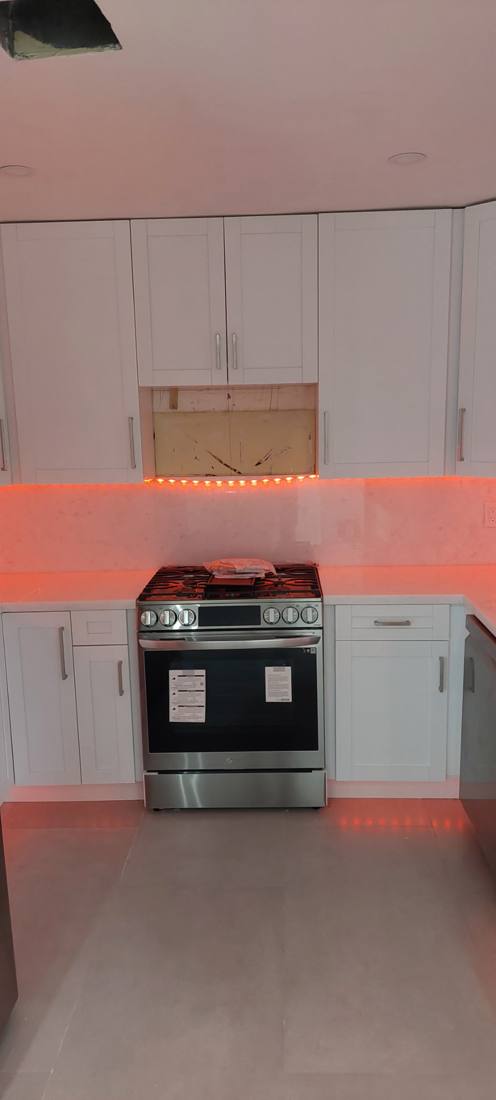 New white shaker kitchen with quartz counters
