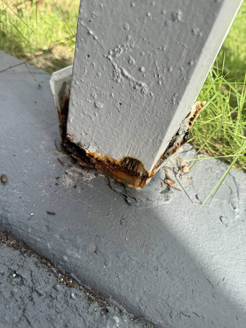 Rusted porch post base